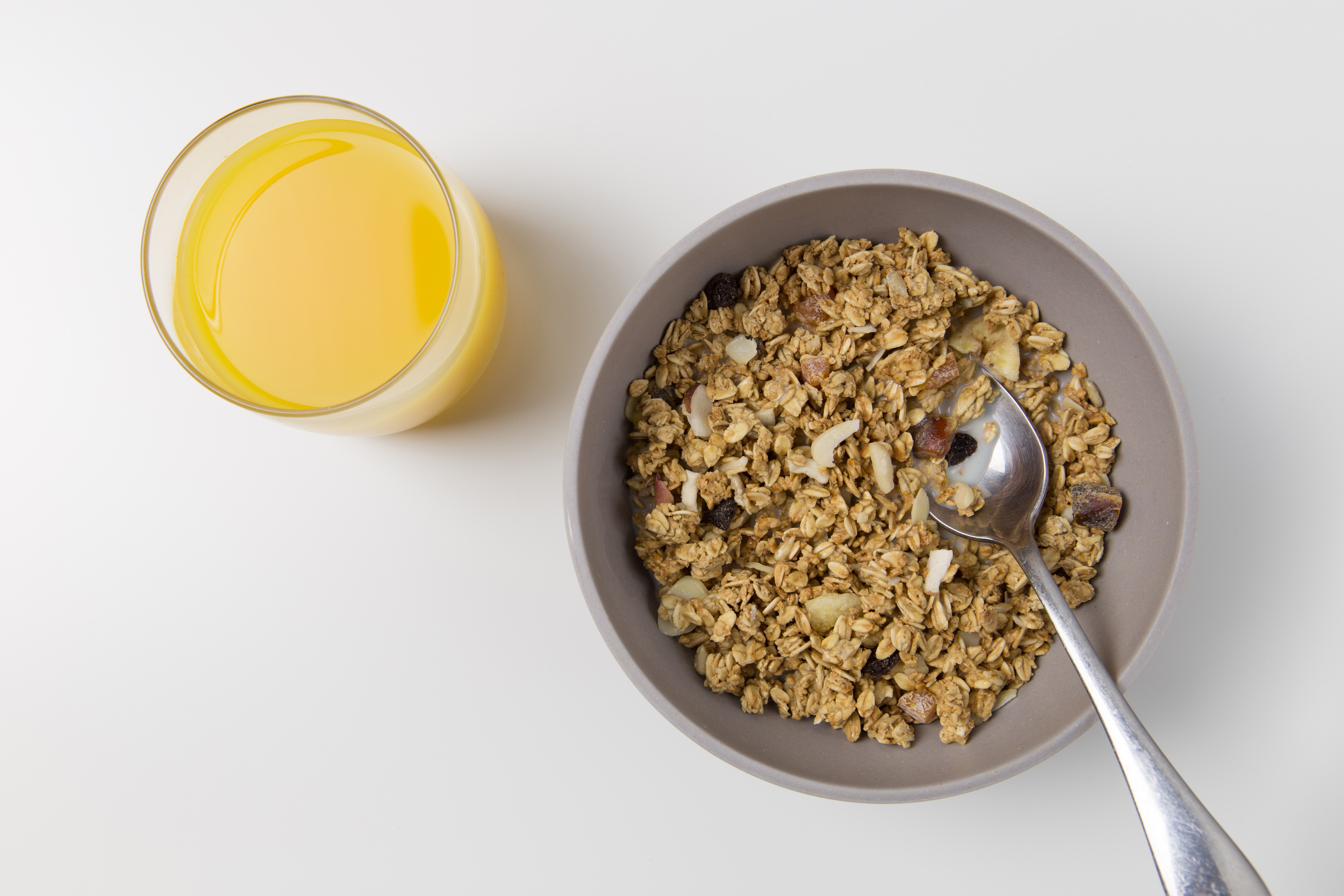 oats in a bowl with orange juice